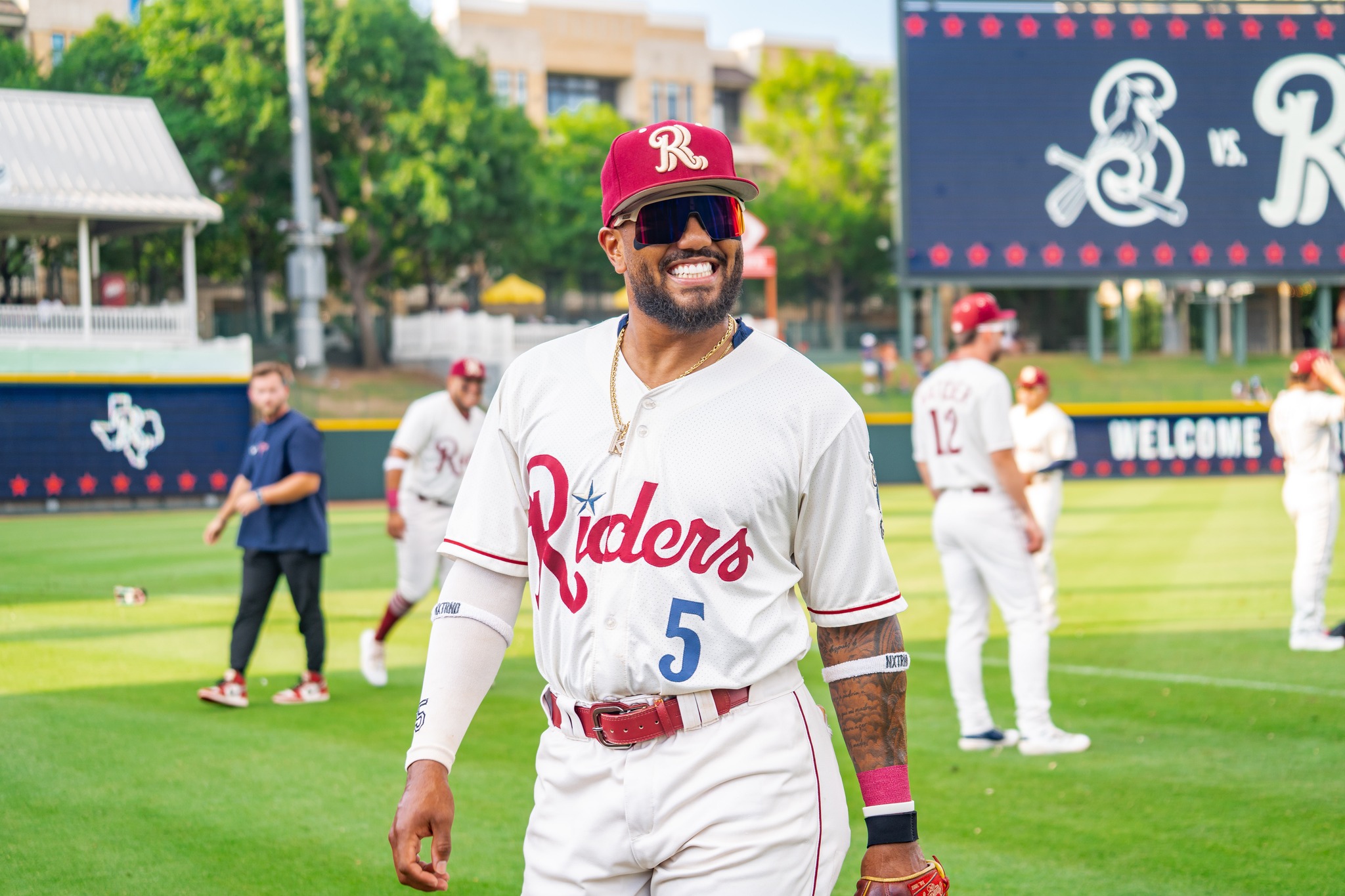Frisco RoughRider in a baseball uniform