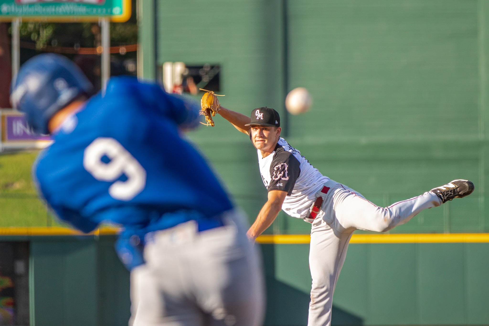 a Frisco RoughRider baseball player throwing a ball