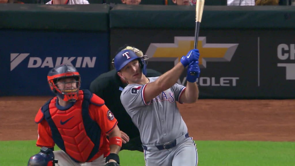 Texas Rangers baseball player swinging a bat