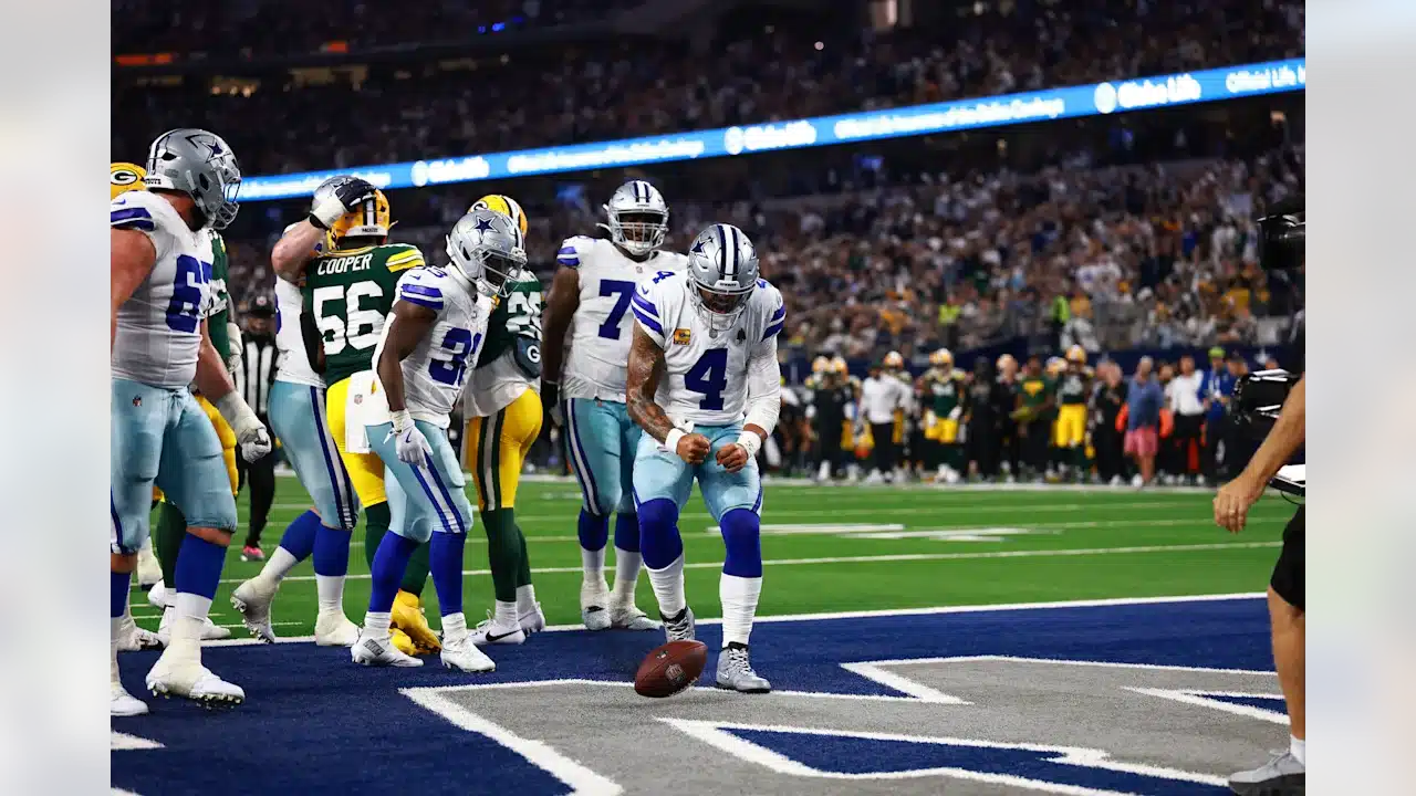 Dallas Cowboys Dak Prescott celebrating a touchdown.