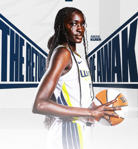Awak Kuier WNBA Basketball player holding a ball.