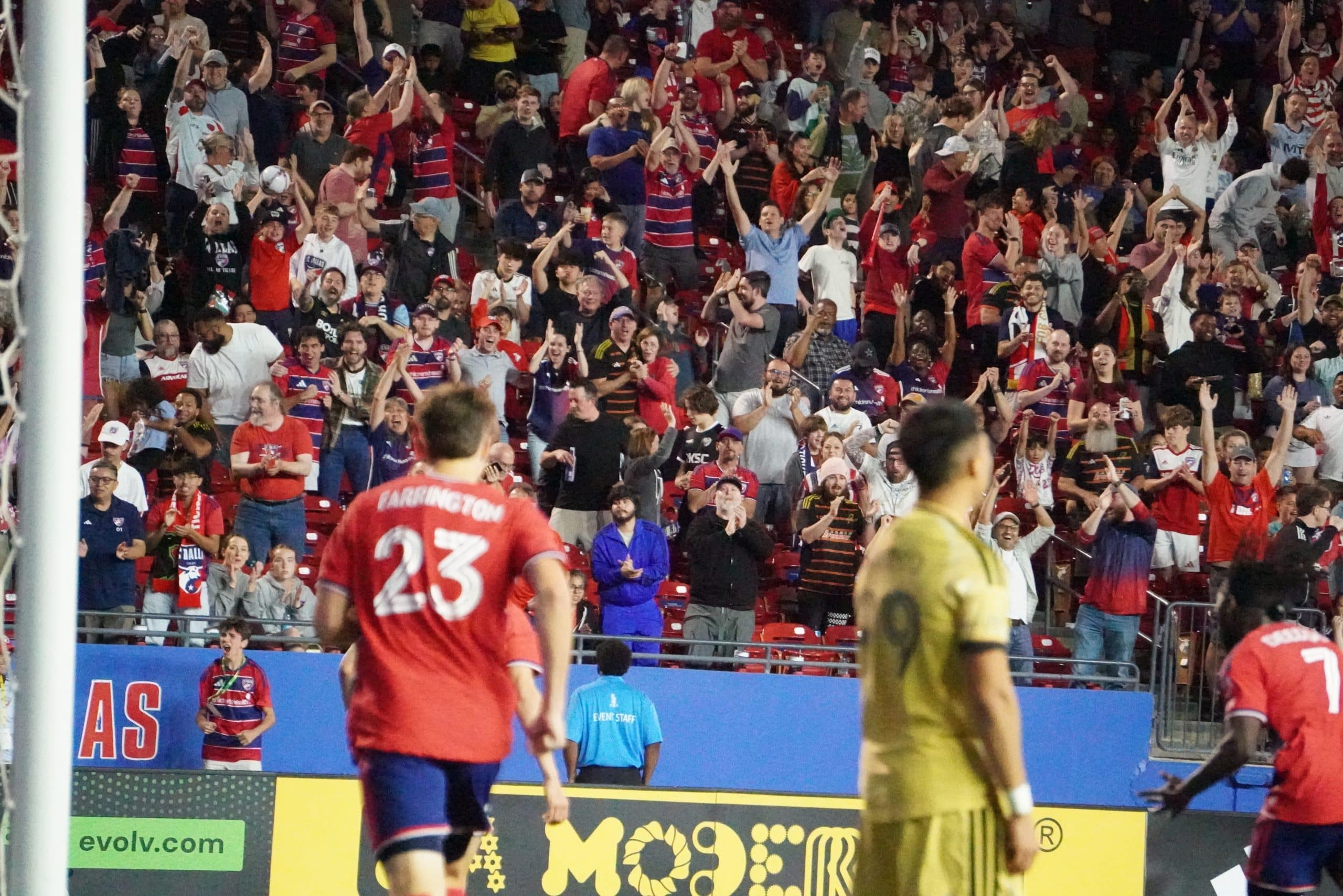 Excited FC Dallas crowd at a soccer match