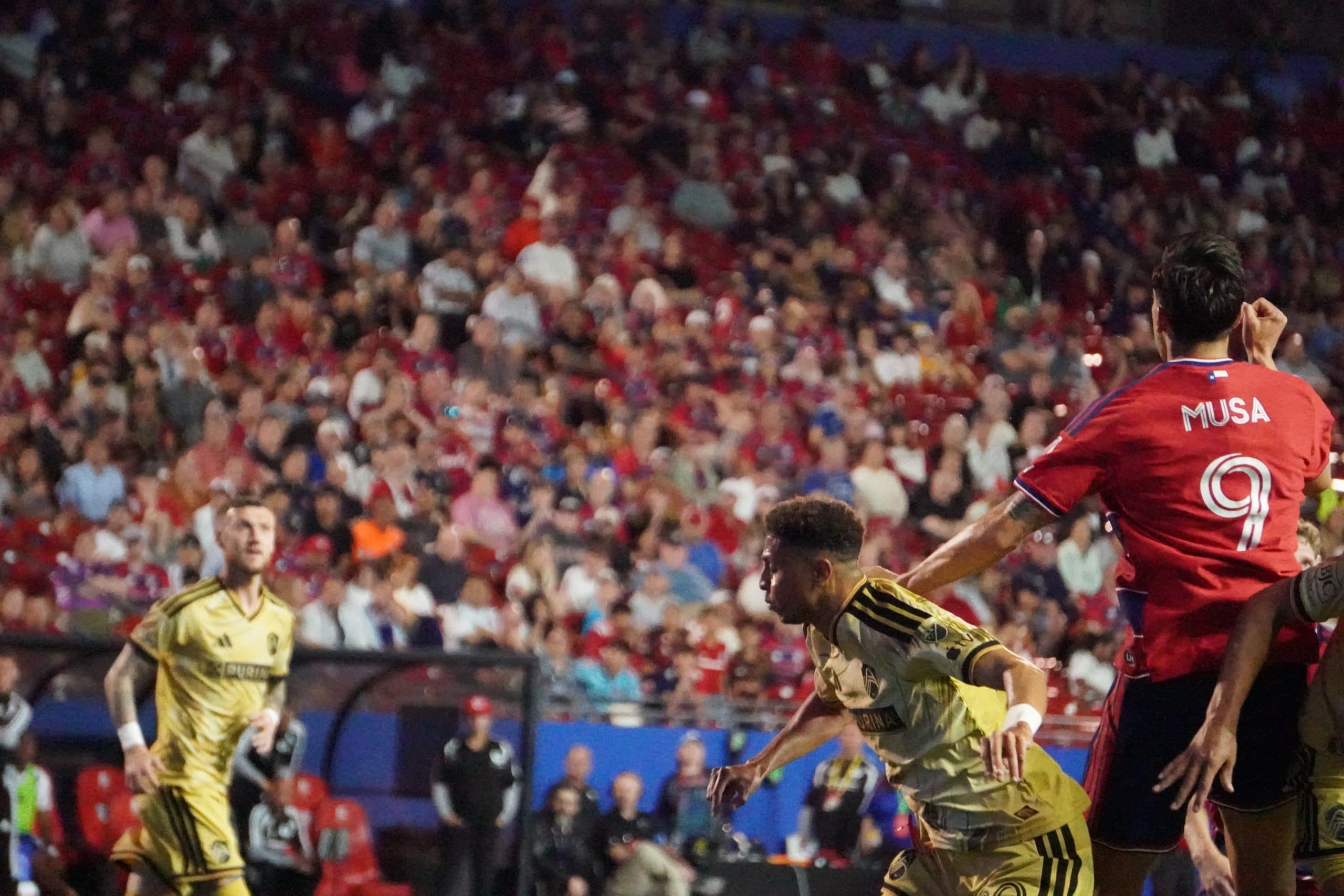 Petar Musa MLS Soccer match with players and crowd