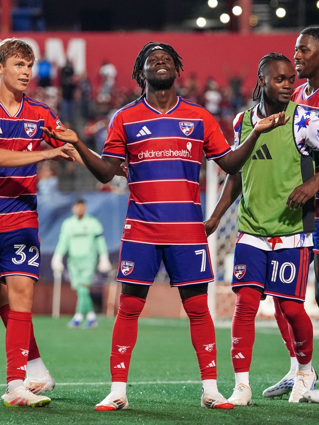 FC Dallas Soccer players celebrating a goal.