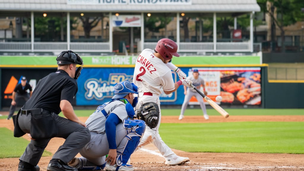 Frisco RoughRiders Baseball player swinging at pitch