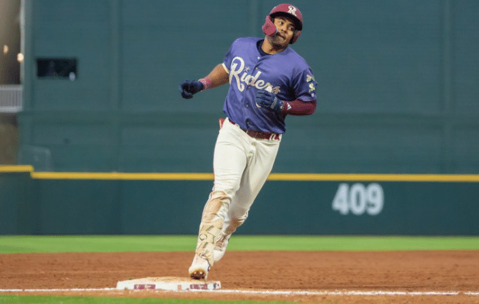 MiLB Frisco Roughriders Baseball player running the bases