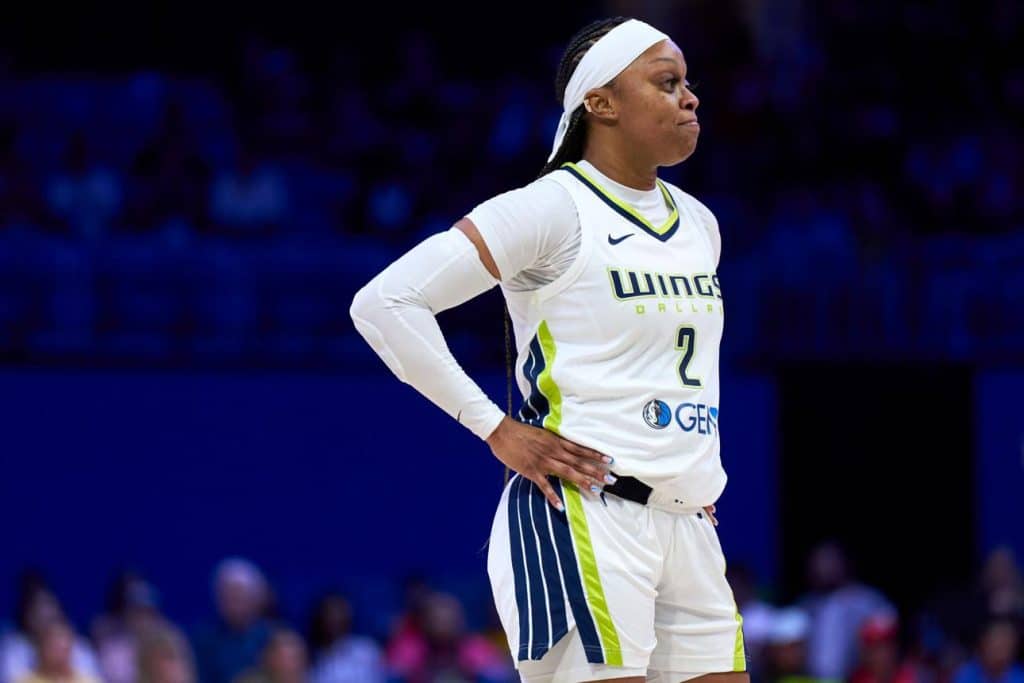 Odyssey Sims WNBA Basketball player in team uniform