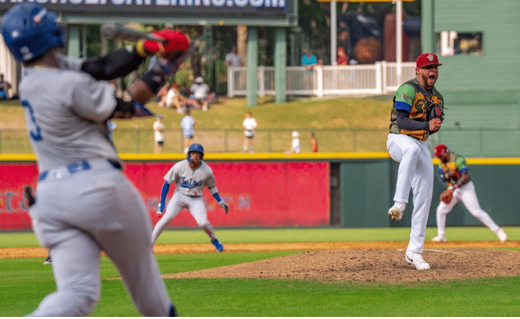 MiLB Frisco Roughriders Baseball pitcher celebrating a strikeout.