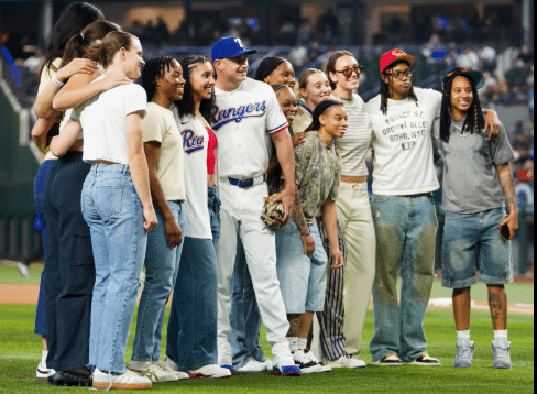 Dallas Wings Group photo at baseball game.