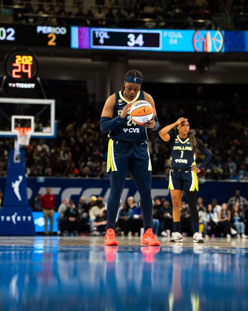 Arike WNBA Basketball players at free throw line