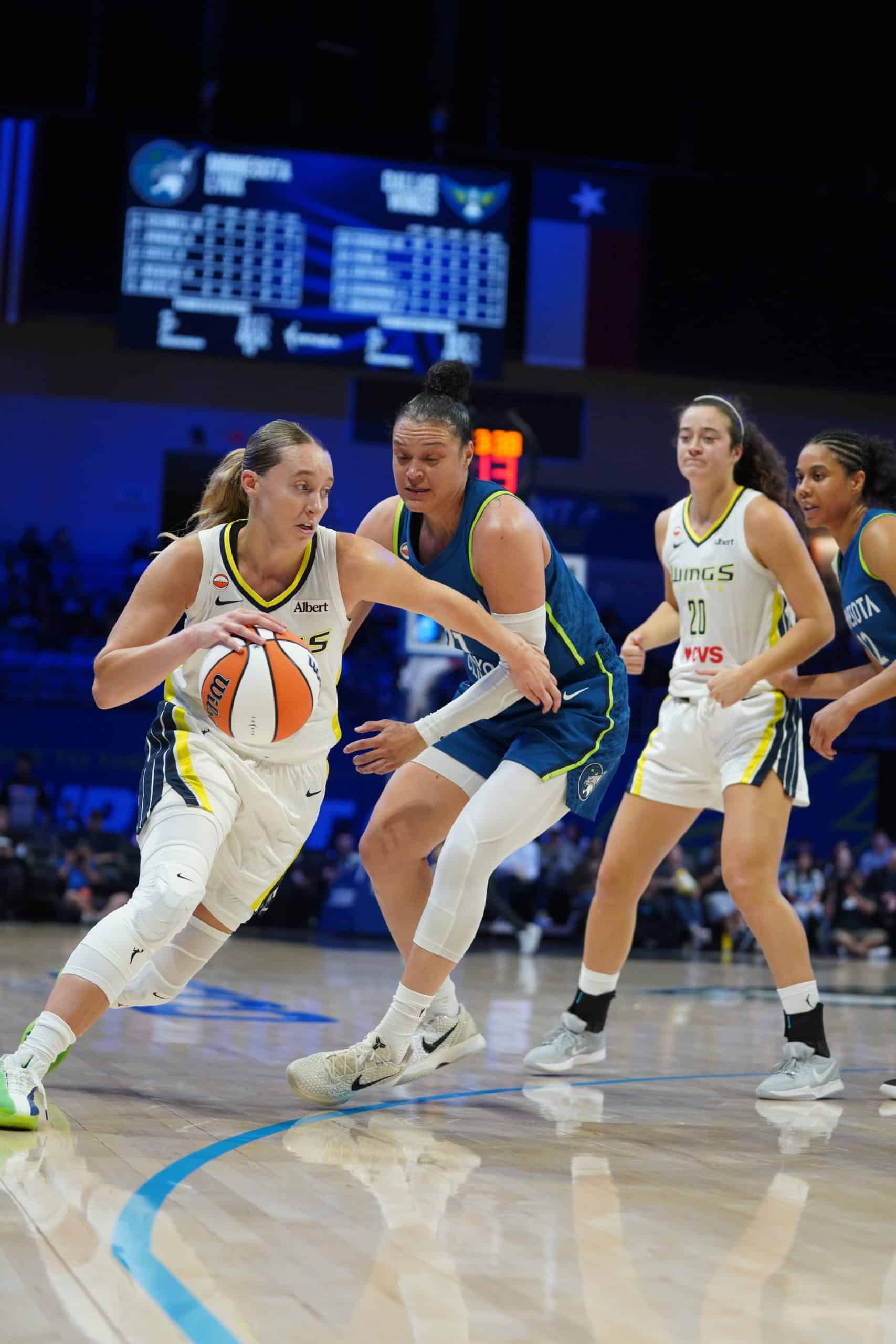 Paige Bueckers Basketball players competing on court