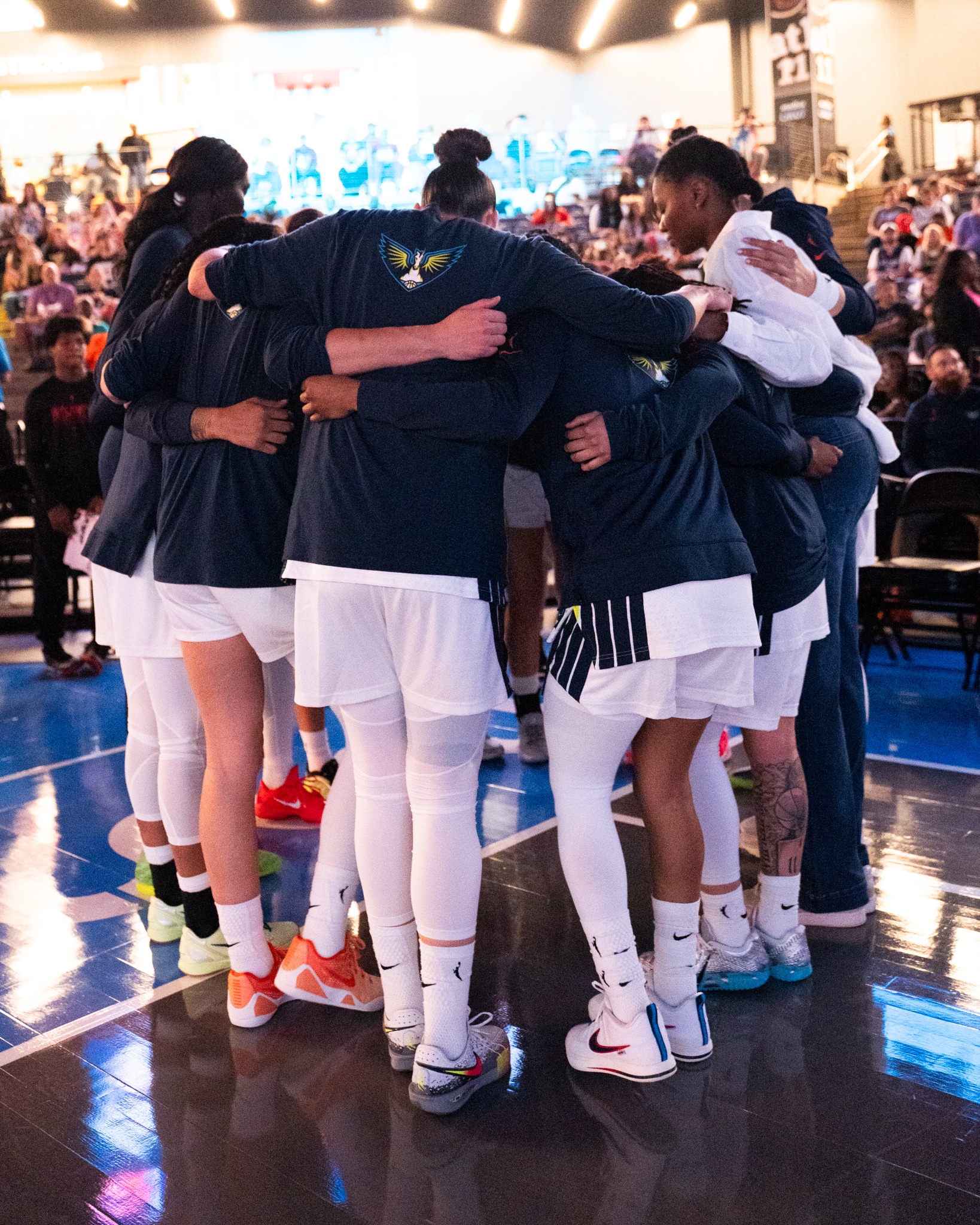 Dallas Wings Team huddle before the game.