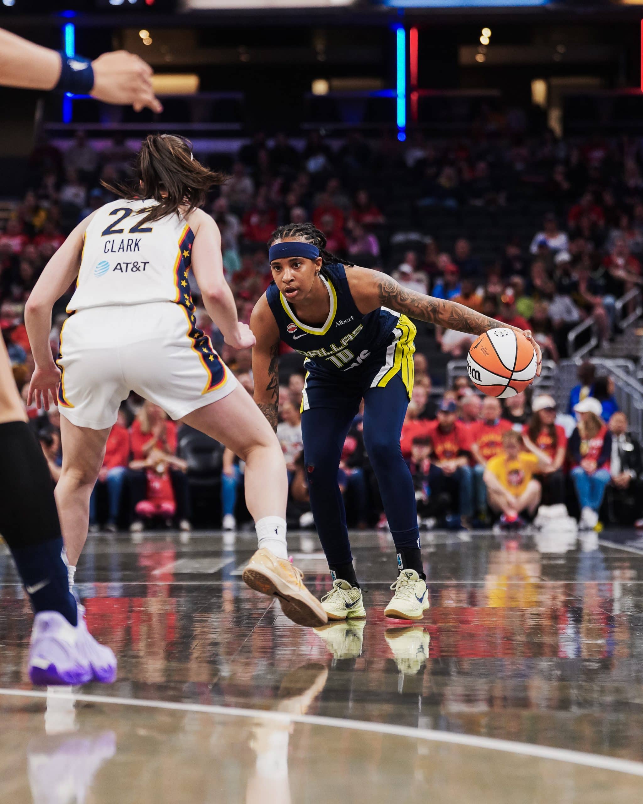 WNBA Basketball players competing on court
