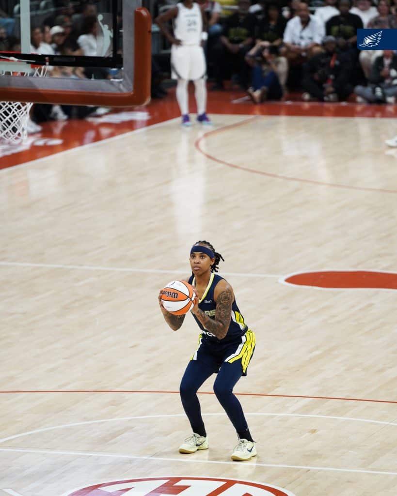 aziaha james Basketball player preparing to shoot