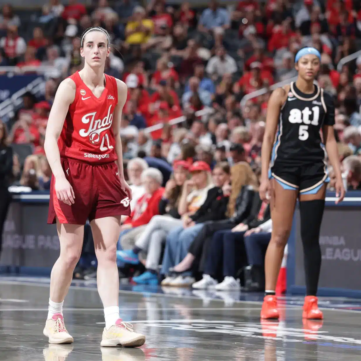 Caitlin Clark Basketball players on the court